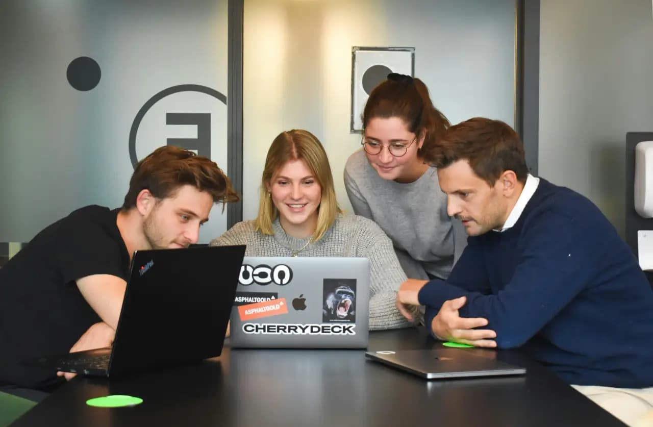 Team collaborating on app development planning